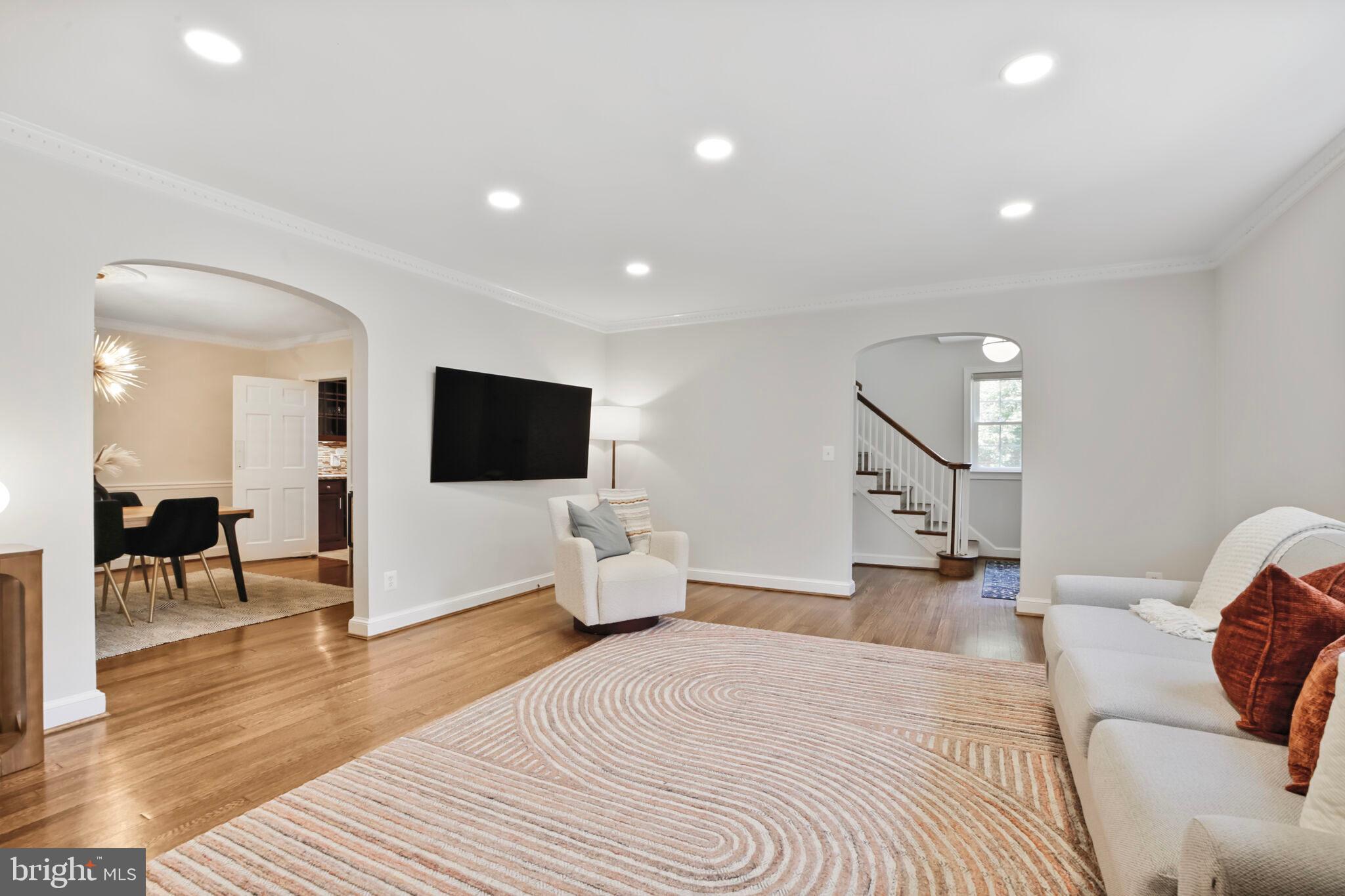 1512 Live Oak Drive Silver Spring, MD 20910 - Photo 8 of 34 a living room with furniture and a flat screen tv