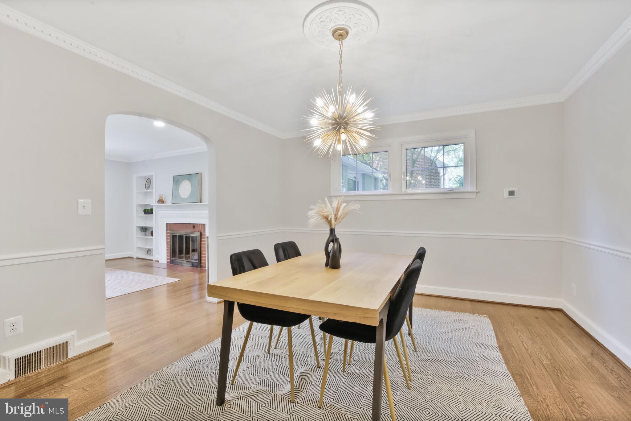 1512 Live Oak Drive Silver Spring, MD 20910 - Photo 9 of 34 a view of a dining room with furniture and wooden floor