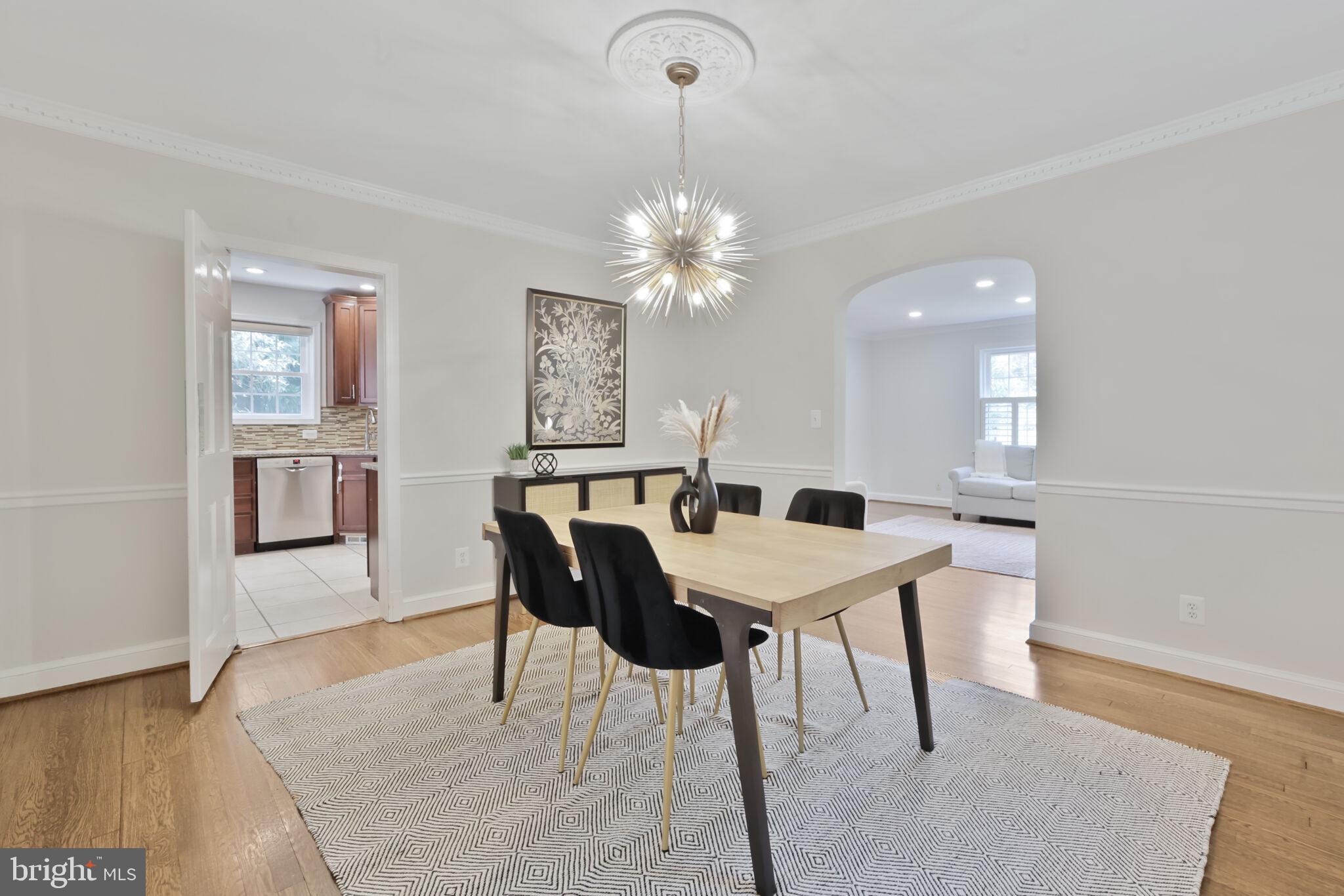 1512 Live Oak Drive Silver Spring, MD 20910 - Photo 10 of 34 a view of a dining room with furniture and wooden floor