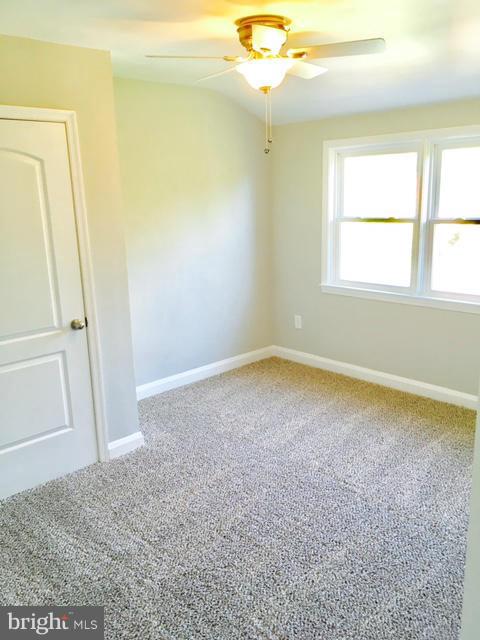 6023 Falkirk Road Baltimore, MD 21239 - Photo 13 of 20 an empty room with a window