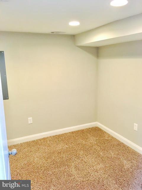 6023 Falkirk Road Baltimore, MD 21239 - Photo 18 of 20 a view of an empty room