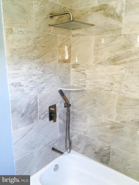 6023 Falkirk Road Baltimore, MD 21239 - Photo 10 of 20 a bathroom with a shower