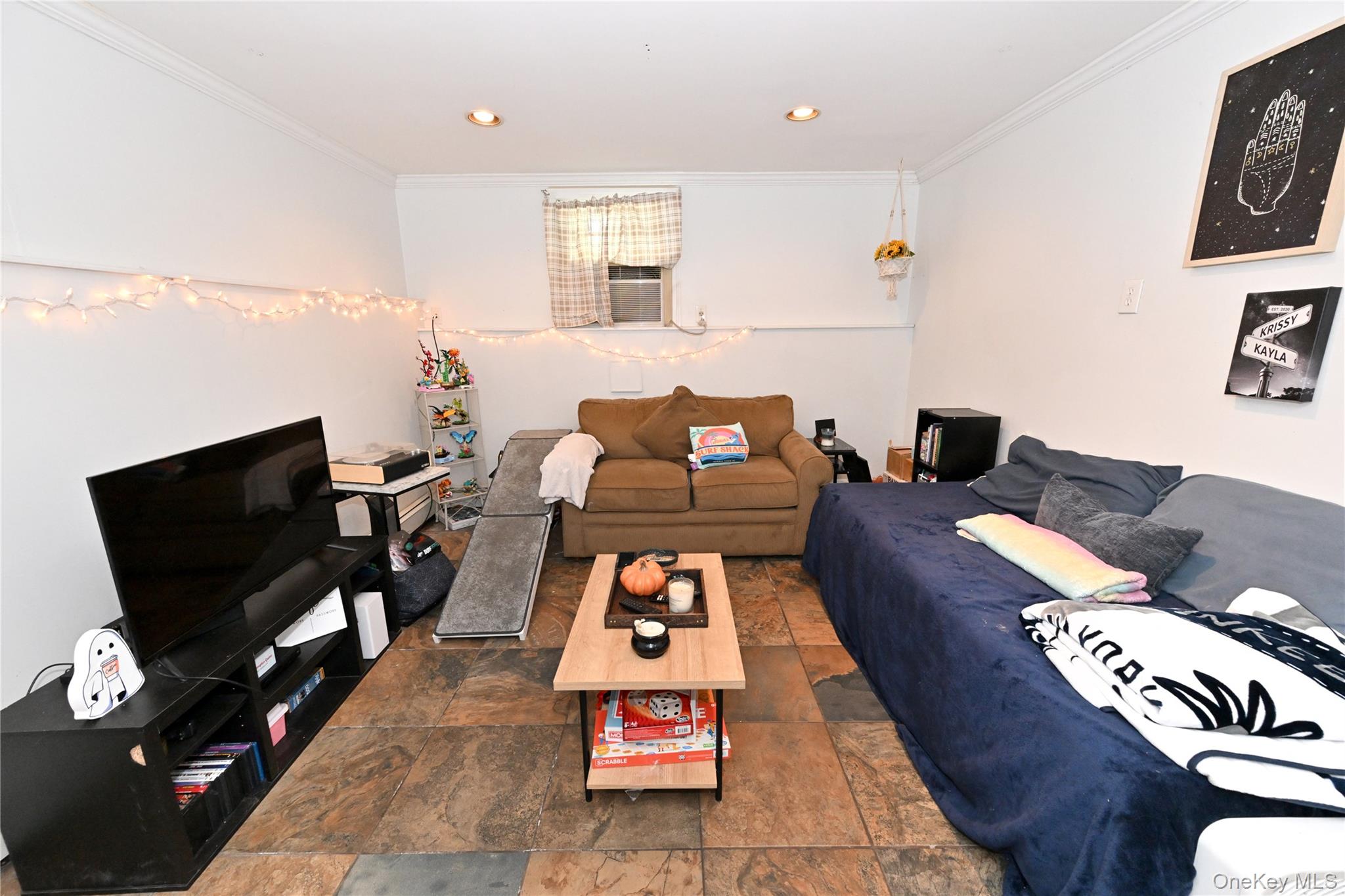 41 Harkin Road Carmel, NY 10512 - Photo 15 of 20 a living room with furniture and a flat screen tv
