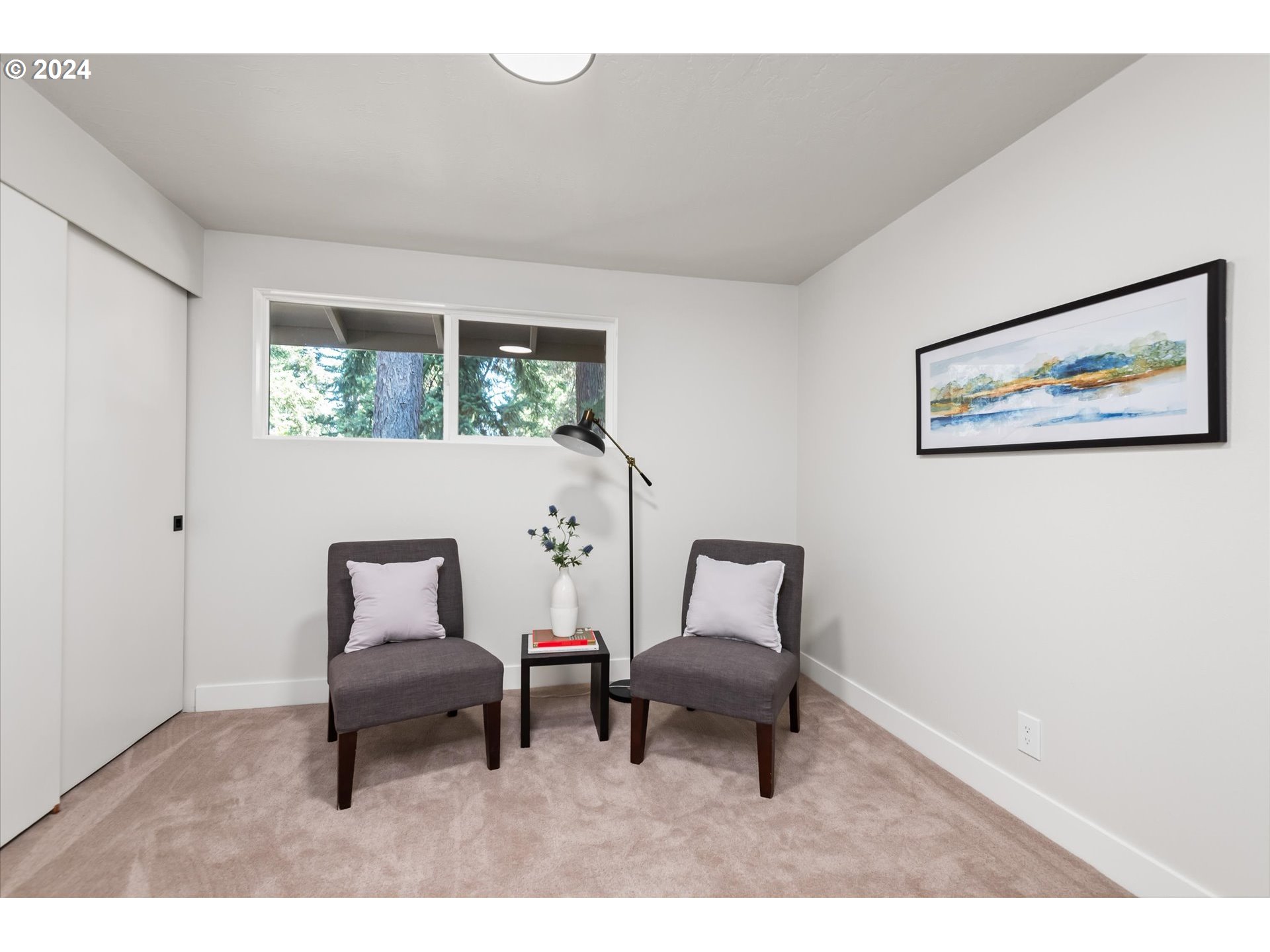 70 Coachman Drive Eugene, OR 97405 - Photo 19 of 43 a view of a livingroom with furniture and windows