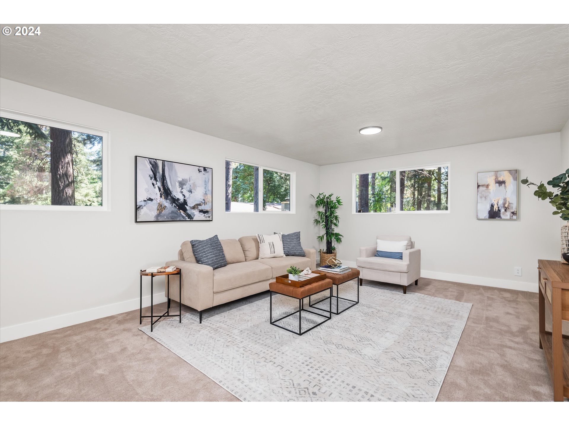 70 Coachman Drive Eugene, OR 97405 - Photo 23 of 43 a living room with furniture and a window