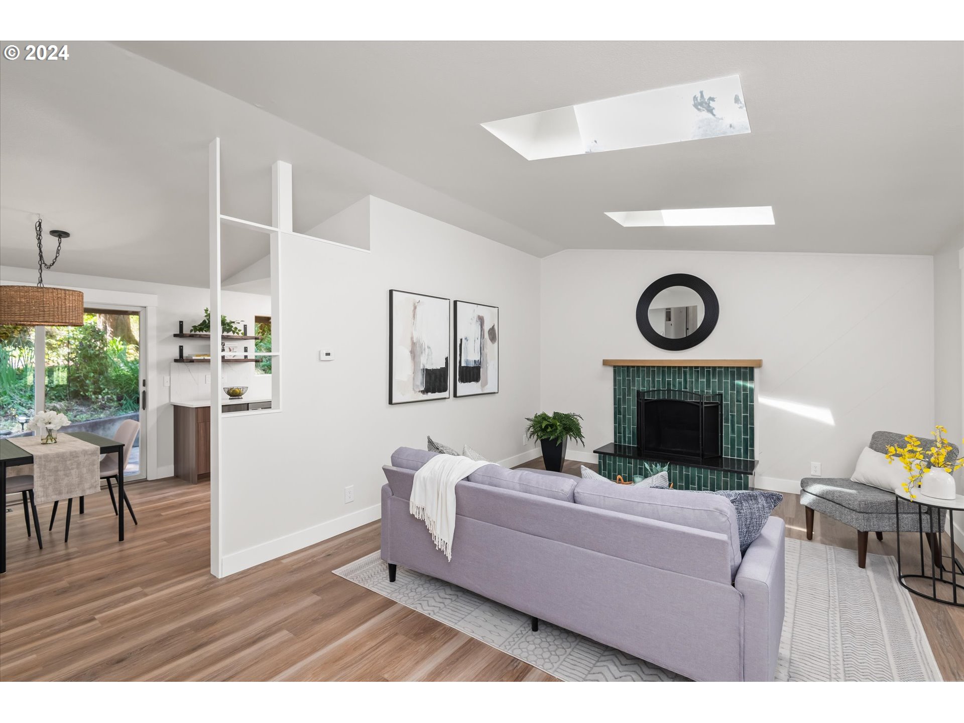 70 Coachman Drive Eugene, OR 97405 - Photo 4 of 43 a living room with furniture and a fireplace