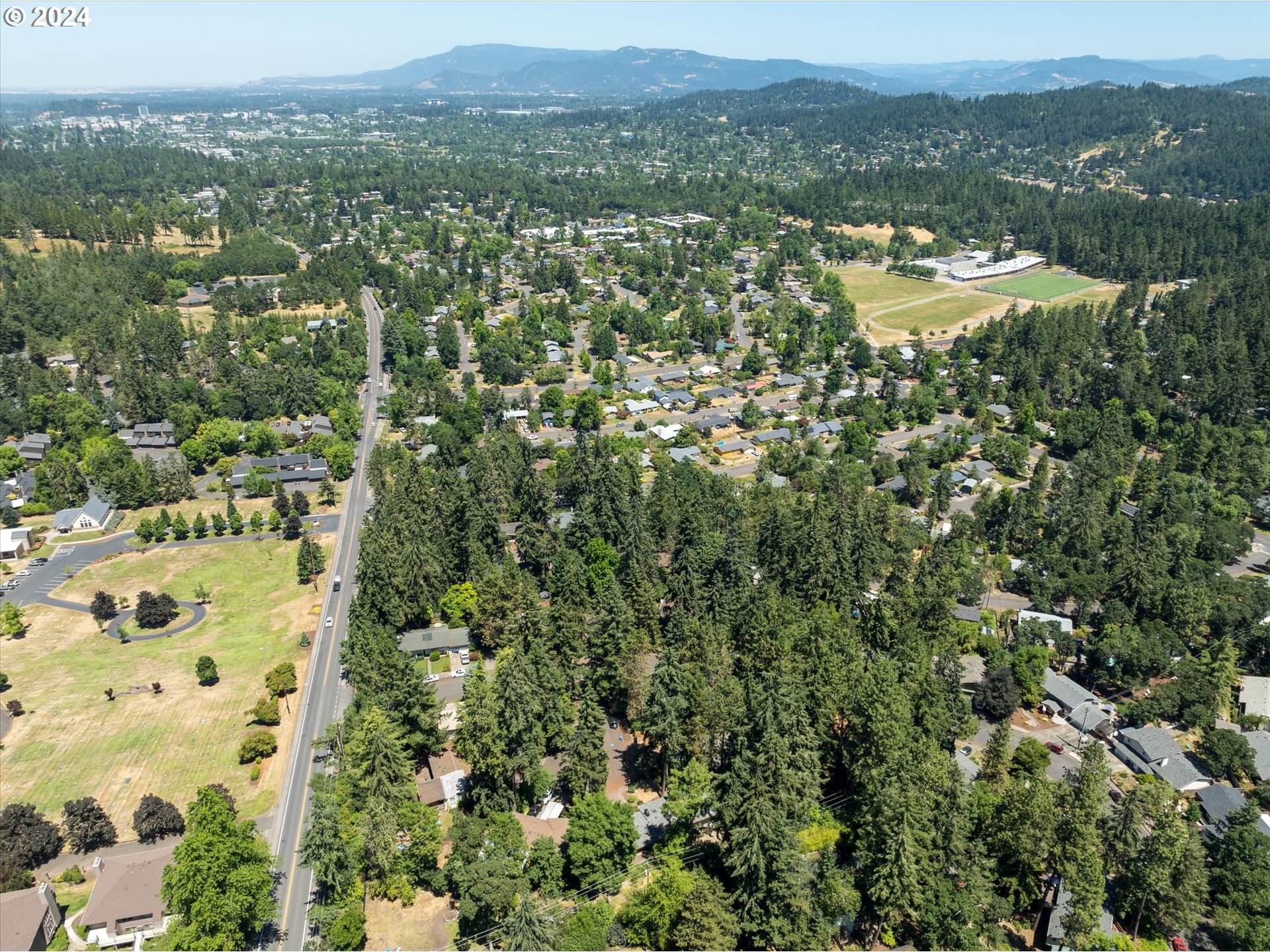 70 Coachman Drive Eugene, OR 97405 - Photo 42 of 43 an aerial view of residential house with outdoor space