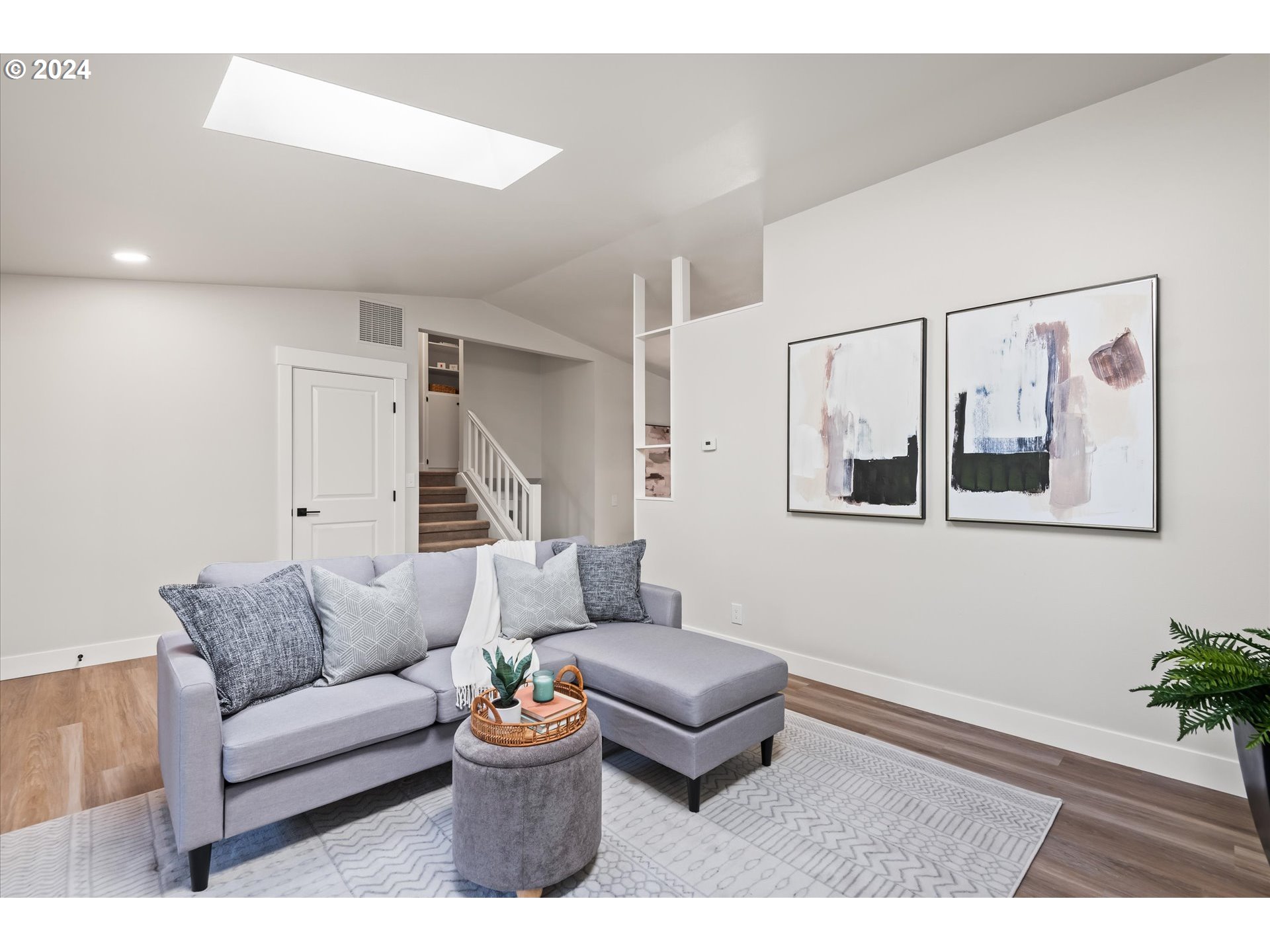 70 Coachman Drive Eugene, OR 97405 - Photo 7 of 43 a living room with furniture and a potted plant