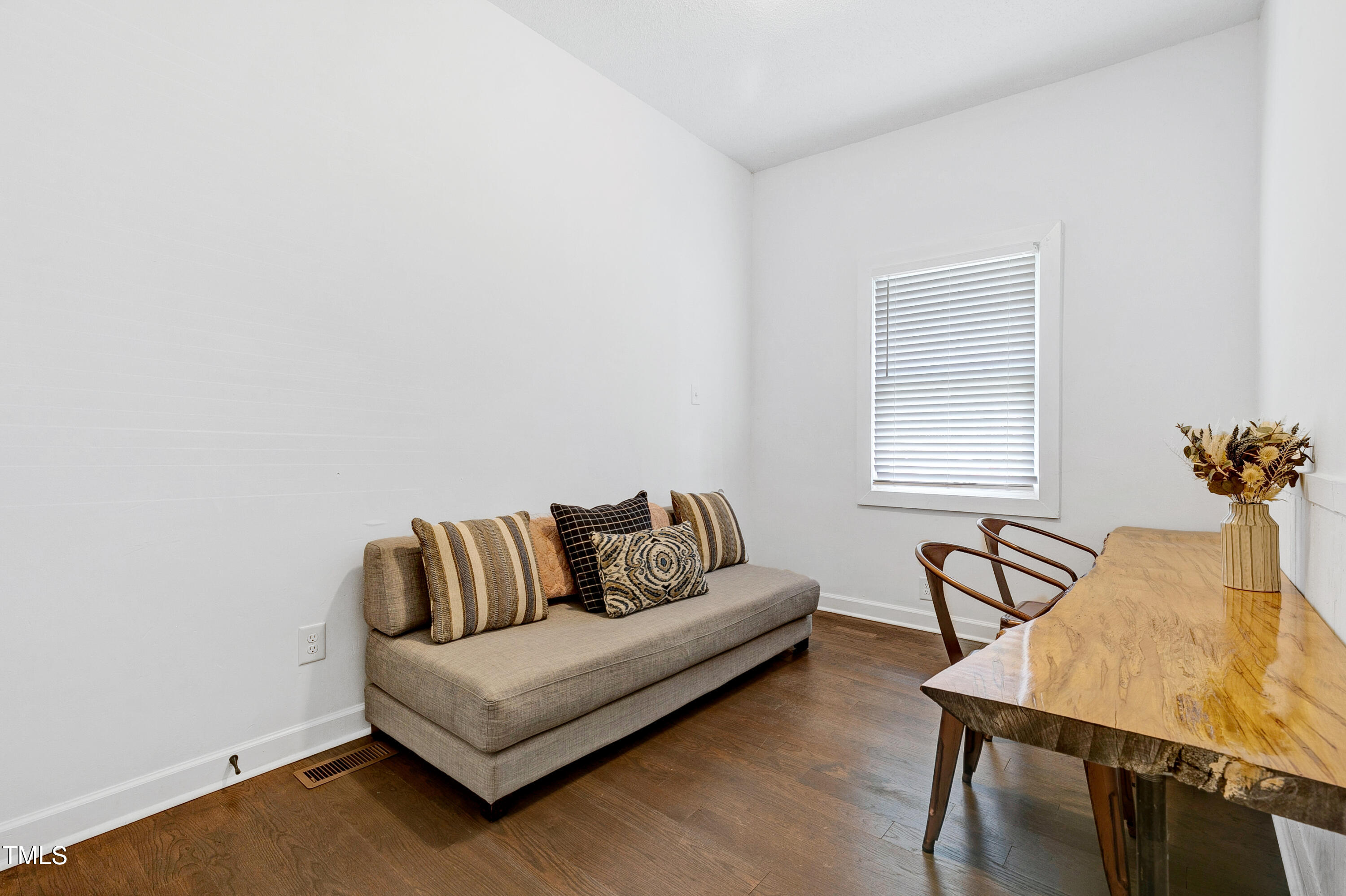 320 East Cabarrus Street Raleigh, NC 27601 - Photo 14 of 30 a living room with furniture and a window