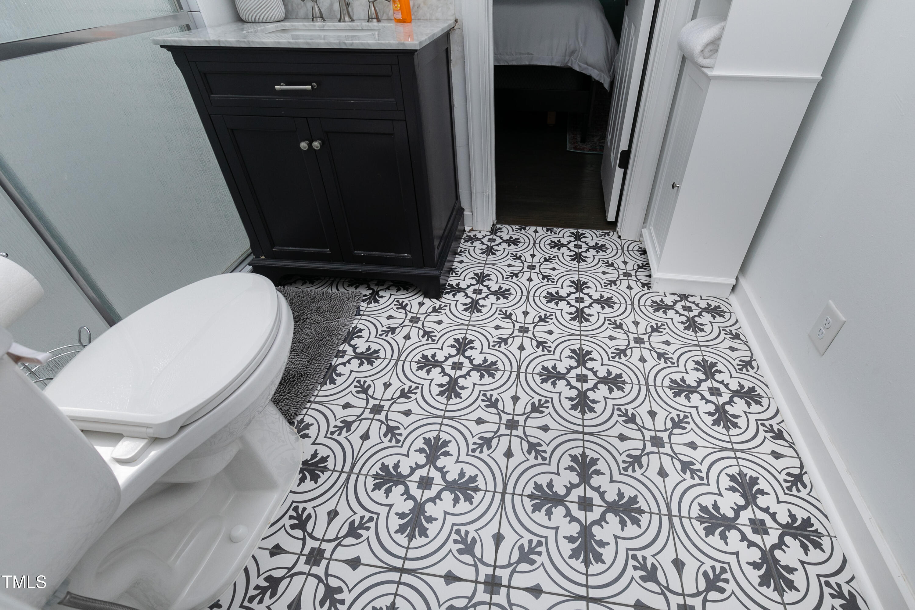320 East Cabarrus Street Raleigh, NC 27601 - Photo 20 of 30 a bathroom with a toilet and a shower