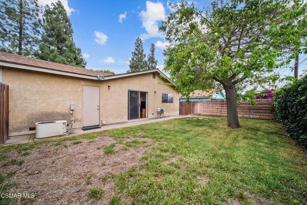 1511 Sequoia Avenue Simi Valley, CA 93063 - Photo 24 of 30 a backyard of a house with plants and tree