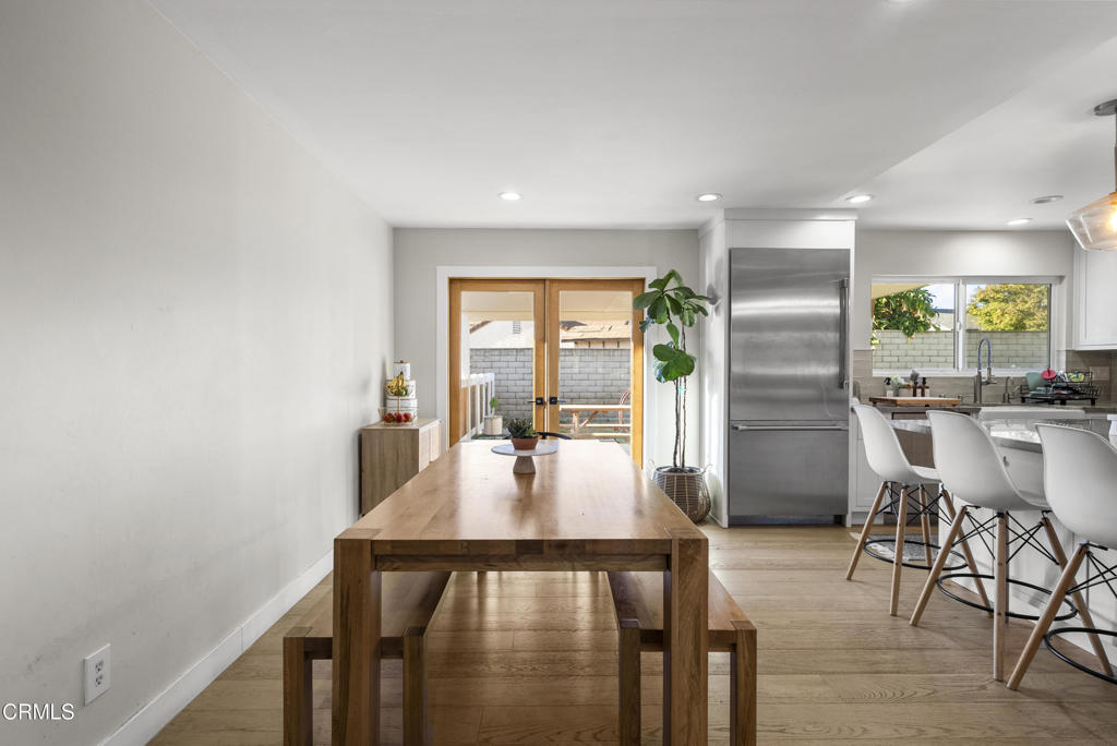 527 Keyser Rondo Camarillo, CA 93010 - Photo 10 of 42 a dining room with furniture and wooden floor