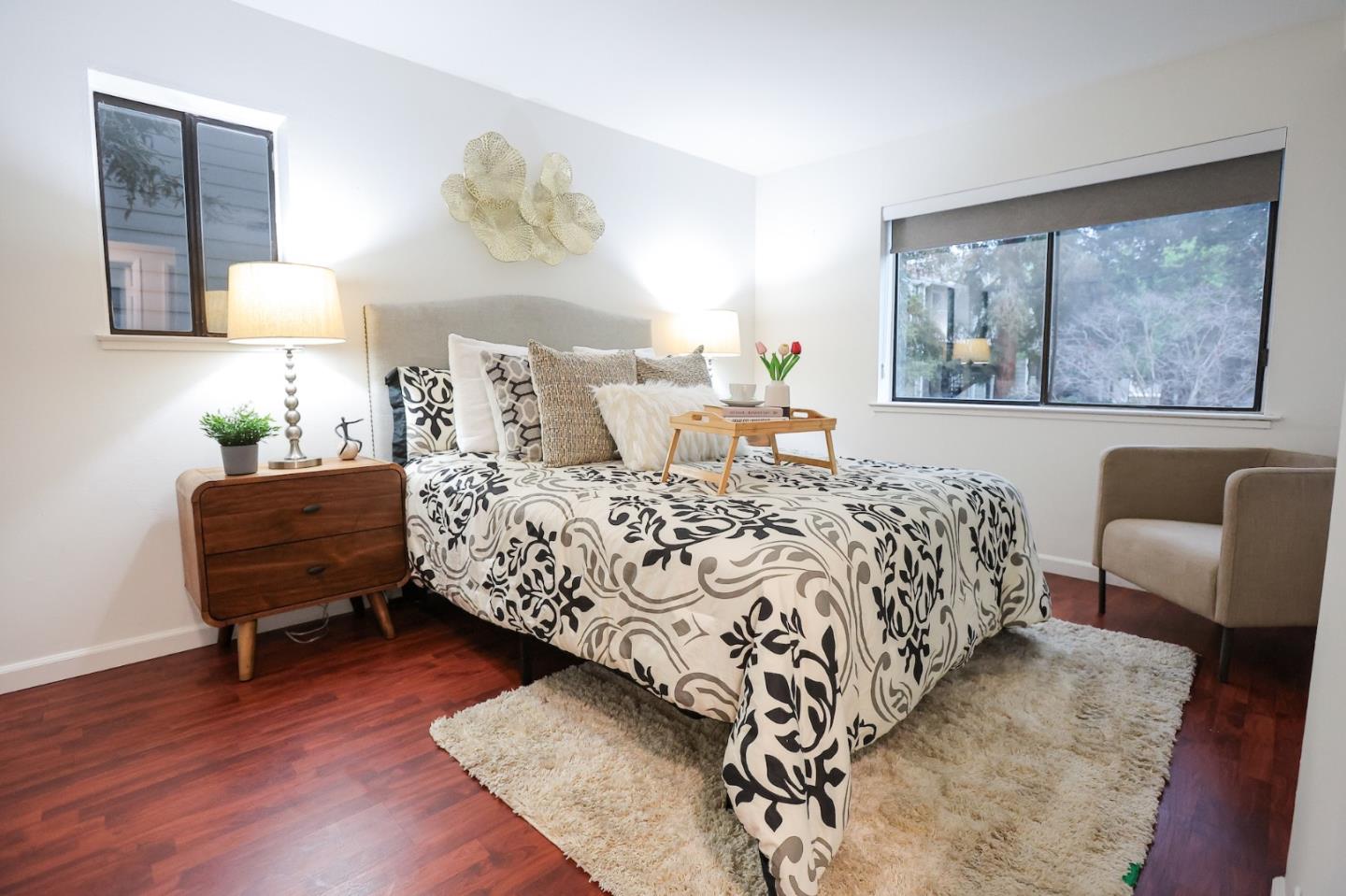 274 Stonegate Circle San Jose, CA 95110 - Photo 11 of 28 a bedroom with a bed and wooden floor