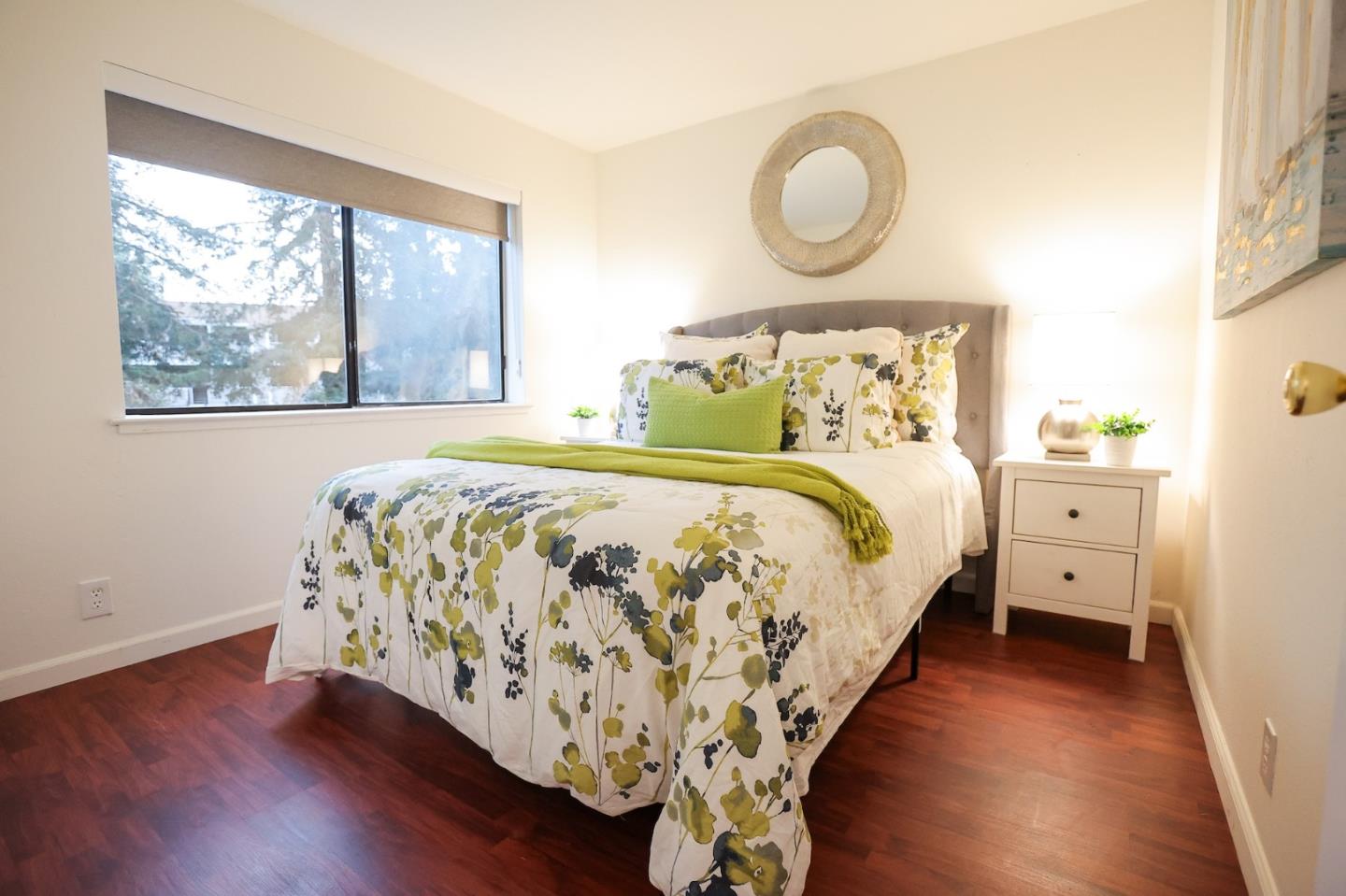 274 Stonegate Circle San Jose, CA 95110 - Photo 14 of 28 a bedroom with a bed and a window