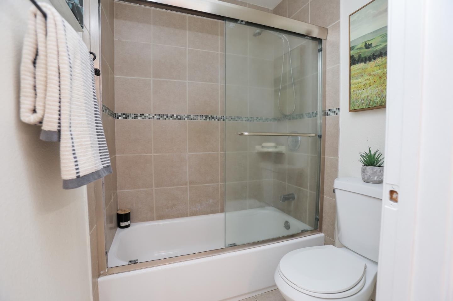 274 Stonegate Circle San Jose, CA 95110 - Photo 17 of 28 a bathroom with a toilet and shower