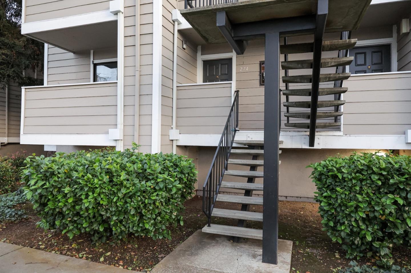 274 Stonegate Circle San Jose, CA 95110 - Photo 22 of 28 a view of a house with potted plants and a yard