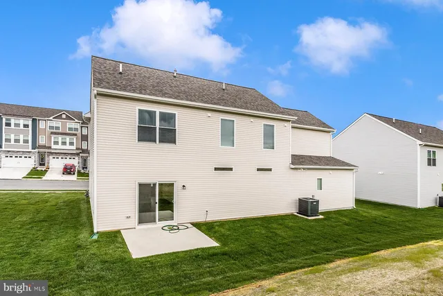 a front view of house with yard