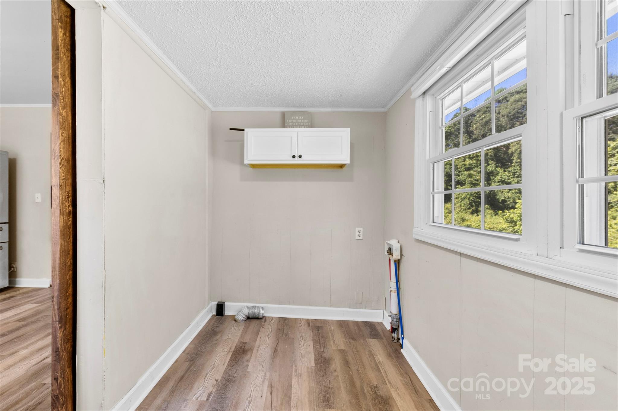 2009 Auten Road Gastonia, NC 28054 - Photo 15 of 30 a view of a room with wooden floor and windows