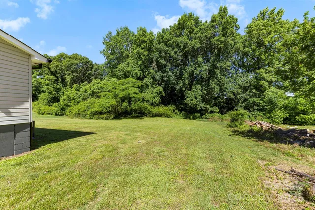 a view of a yard with an outdoor space