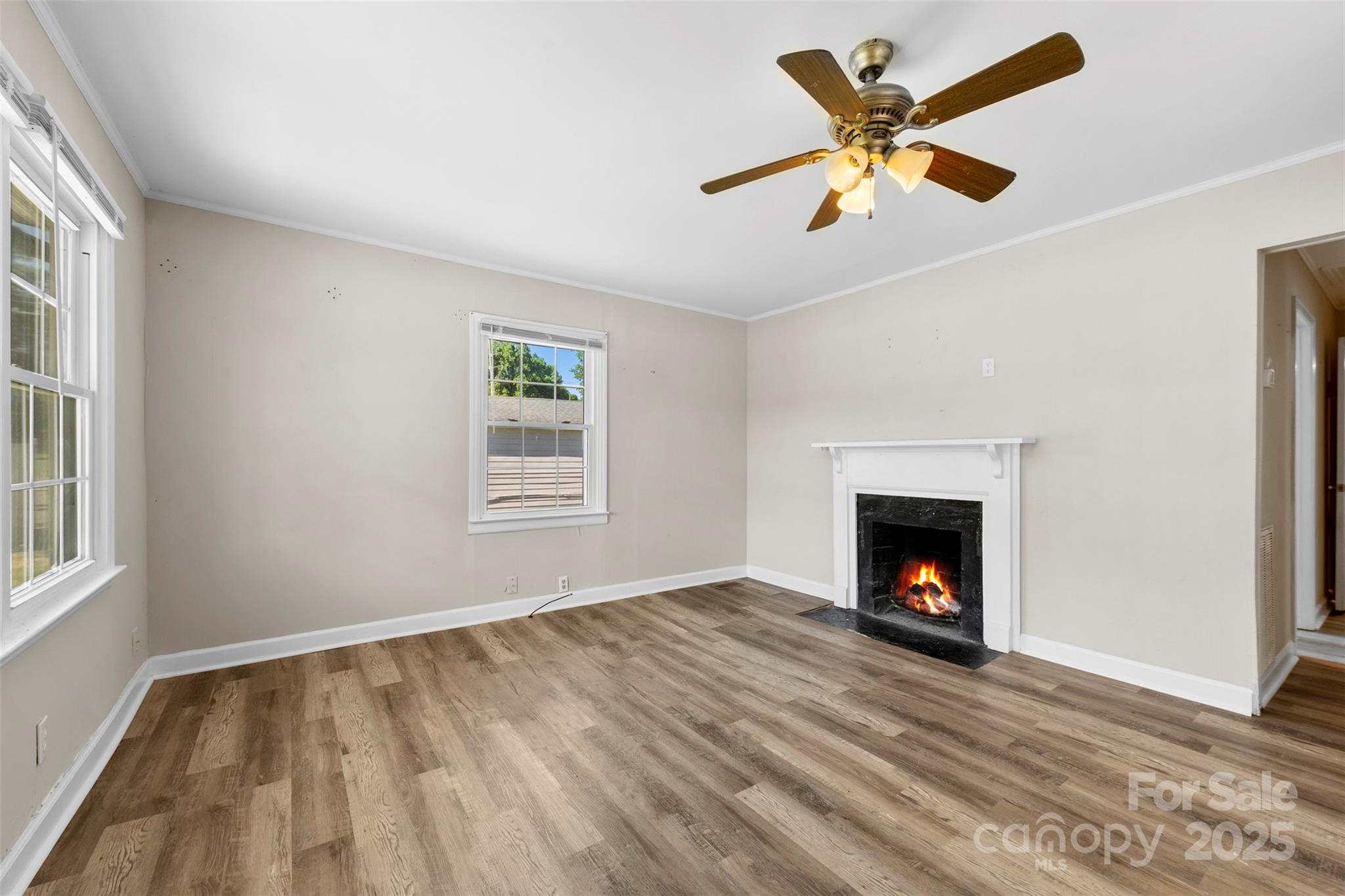 2009 Auten Road Gastonia, NC 28054 - Photo 3 of 30 a view of an empty room with window and fire place