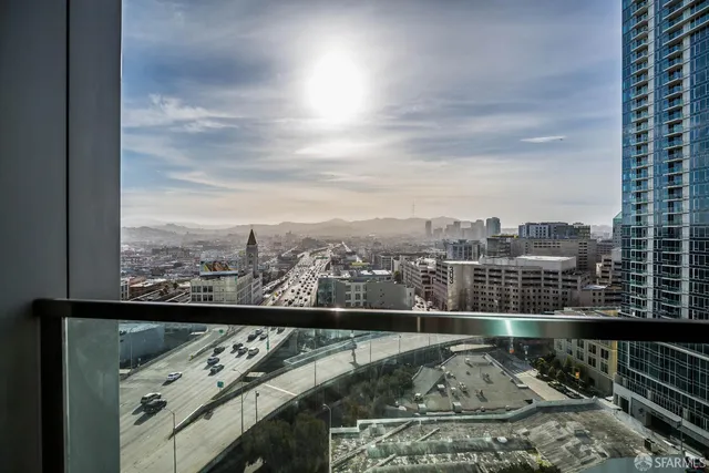 a view of a lake from a balcony