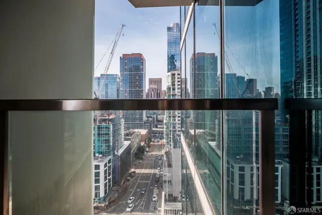 a view of a balcony with an outdoor space