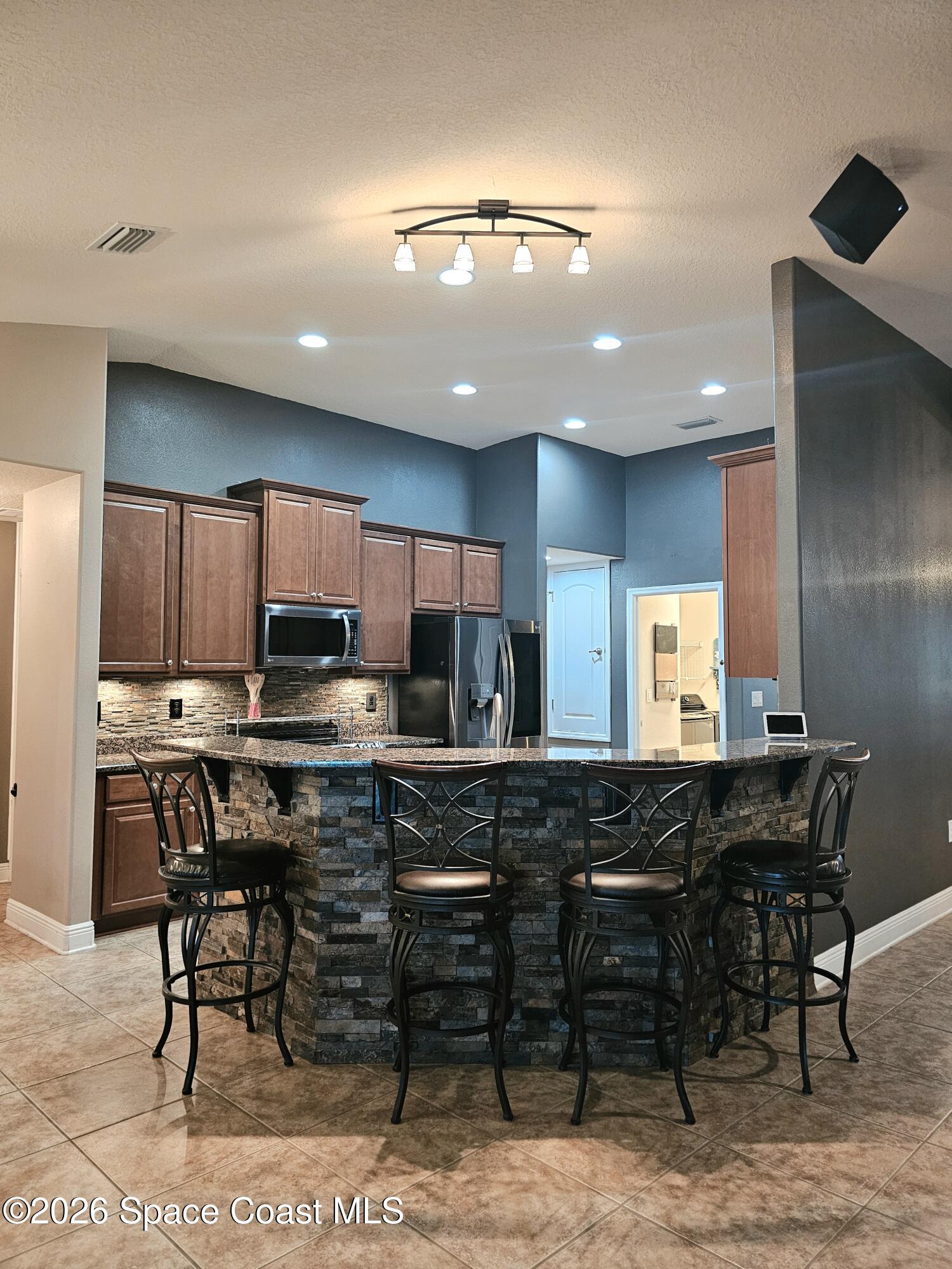 4498 Lady Hawk Way Melbourne, FL 32904 - Photo 11 of 71 Breakfast Bar
