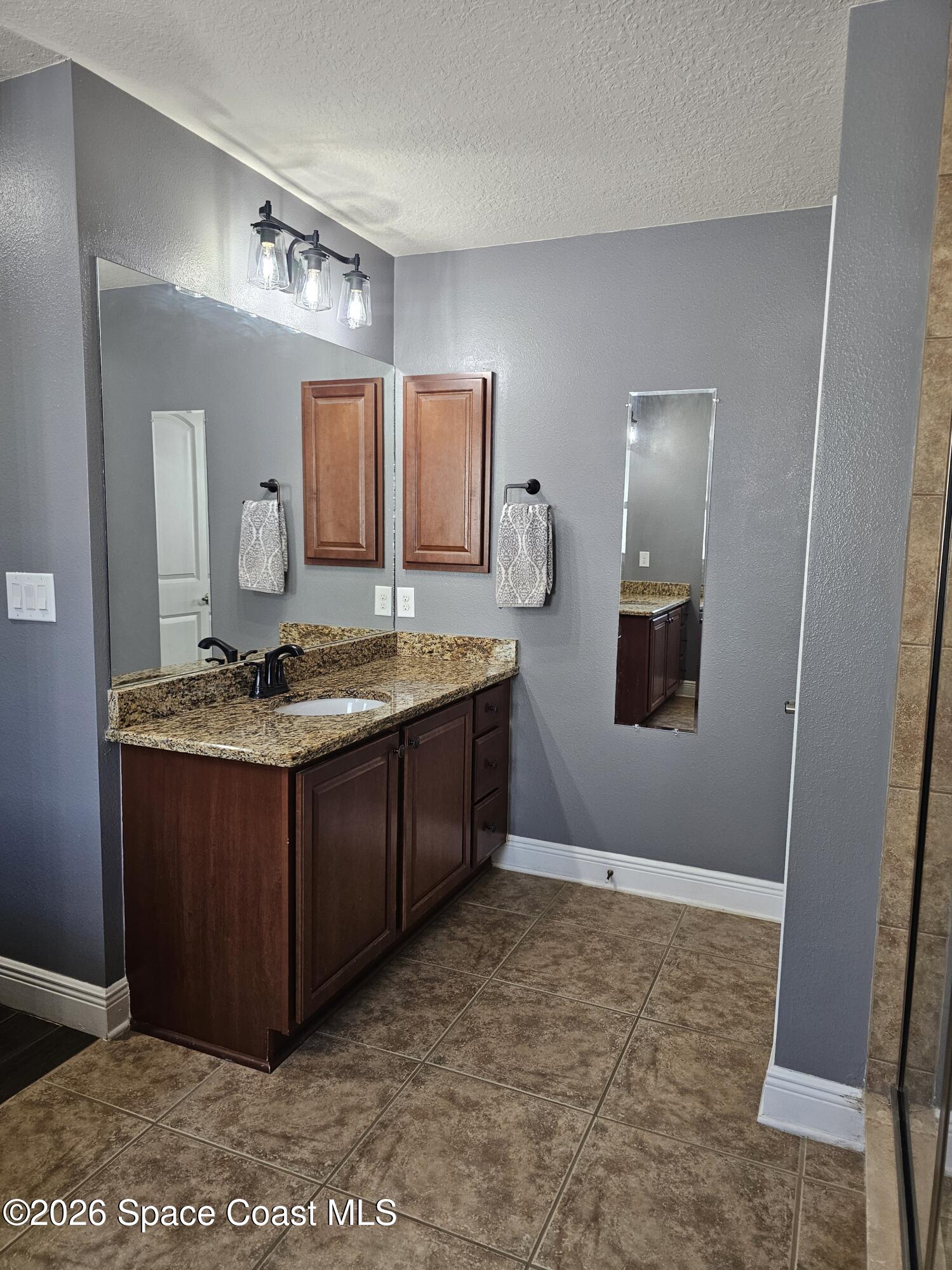 4498 Lady Hawk Way Melbourne, FL 32904 - Photo 33 of 71 Primary Bathroom