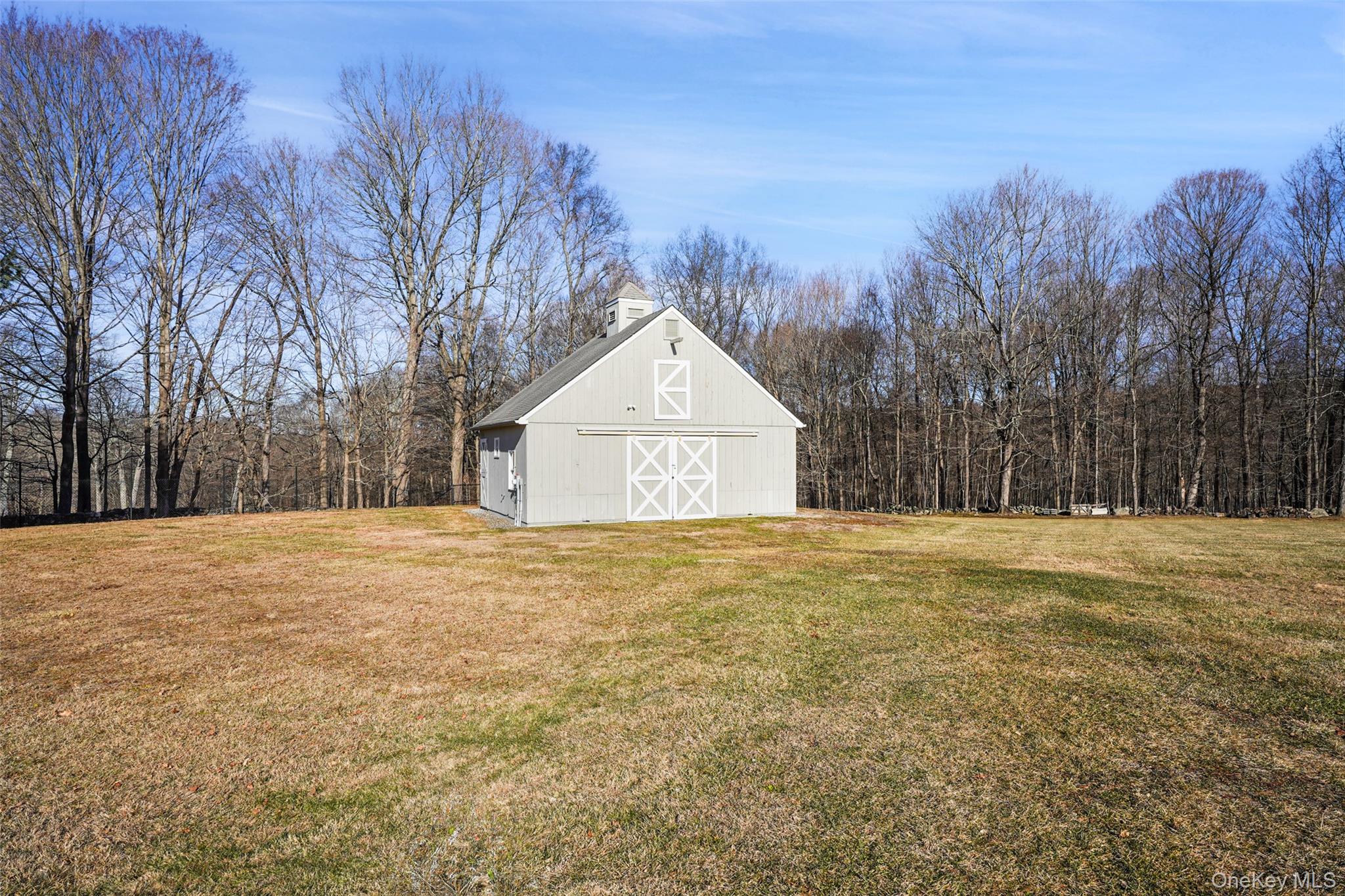 143 North Salem Road Katonah, NY 10536 - Photo 8 of 9 a house with trees in the background