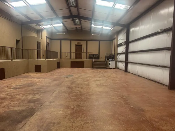 a large room with lots of wooden cabinets