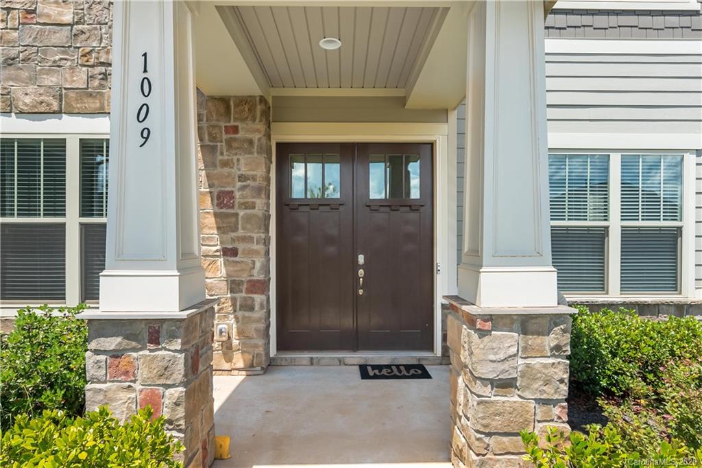 1009 Castle Road Indian Land, SC 29707 - Photo 3 of 37 a front view of a house with a glass door