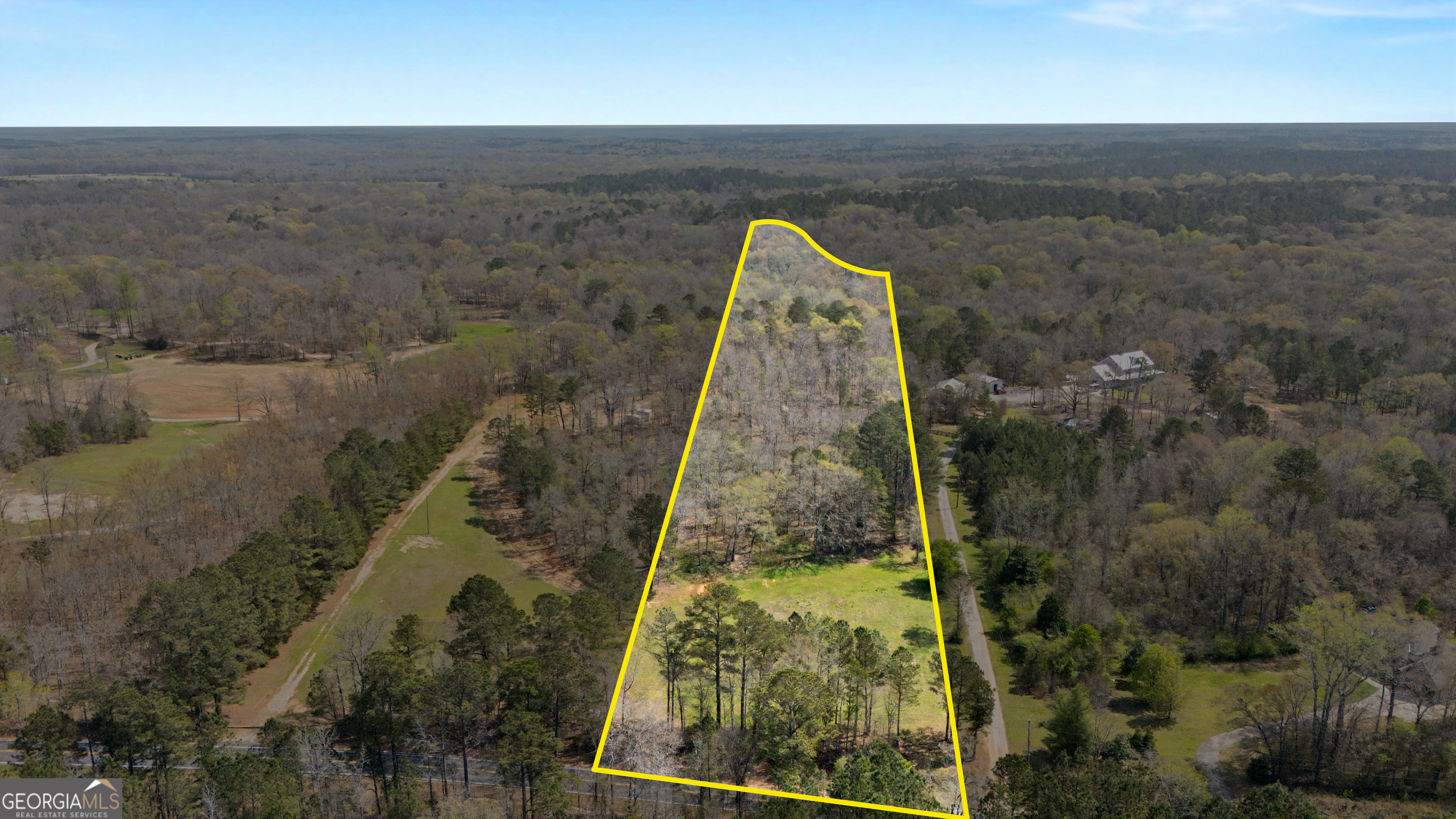 2331 Hollonville Road Brooks, GA 30205 - Photo 1 of 9 a view of a yard