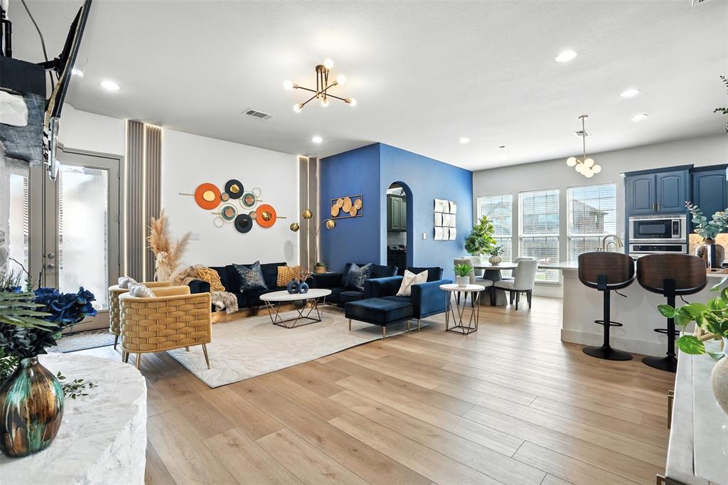 200 Thistle Ridge Denton, TX 76210 - Photo 20 of 31 a living room with furniture and wooden floor