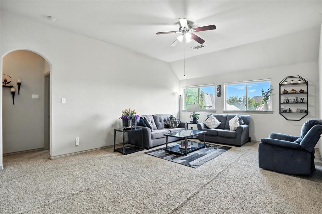 200 Thistle Ridge Denton, TX 76210 - Photo 30 of 31 a living room with furniture and a large window