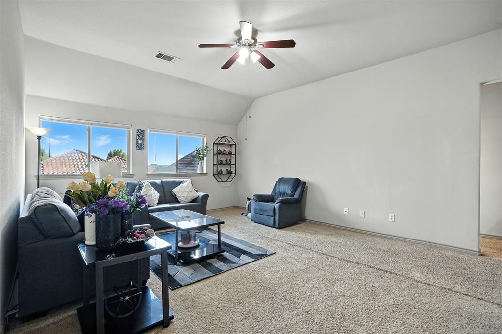 200 Thistle Ridge Denton, TX 76210 - Photo 31 of 31 a living room with furniture
