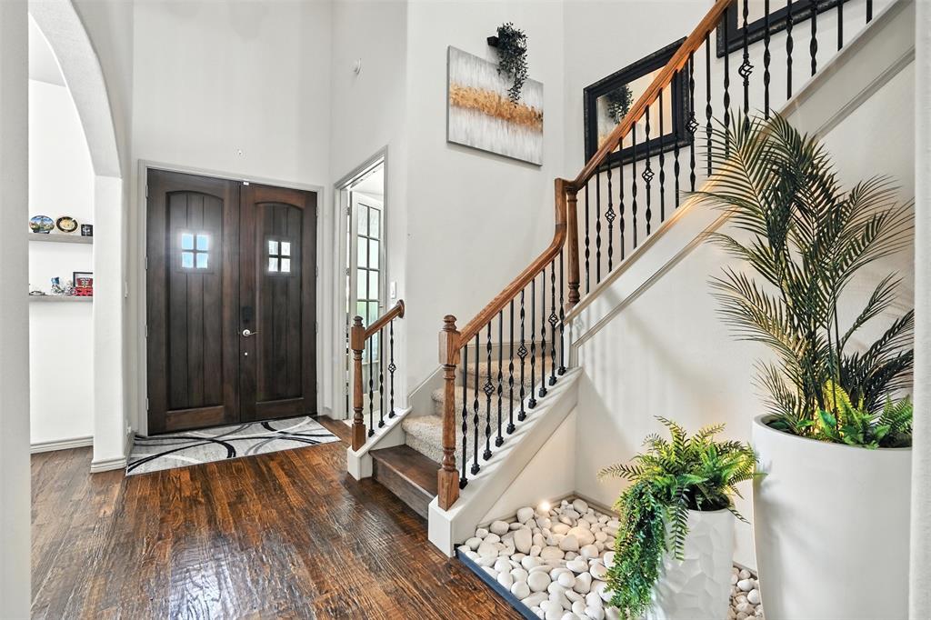 200 Thistle Ridge Denton, TX 76210 - Photo 7 of 31 a view of entryway with wooden floor