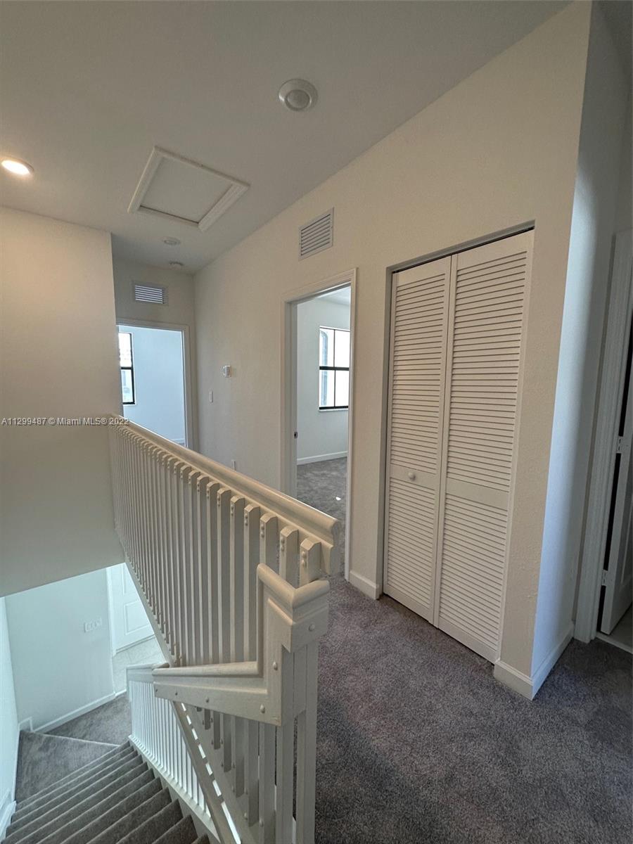 11863 Southwest 247th Terrace, Unit 11863 Homestead, FL 33032 - Photo 8 of 10 a view of entryway with wooden floor