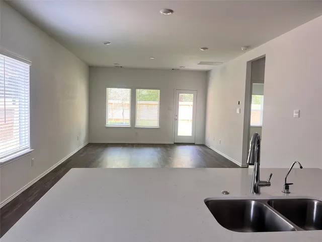 a view of kitchen and a sink