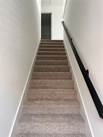 a bathroom with a white bathtub