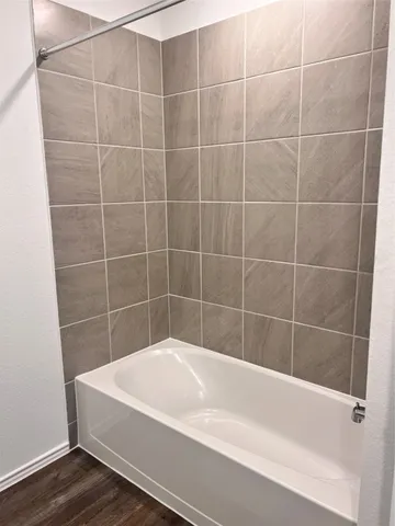 a bathroom with a sink toilet and a mirror