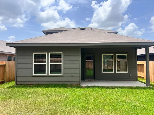 a view of a house with a garden