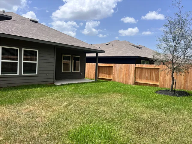 a view of a house with a garden