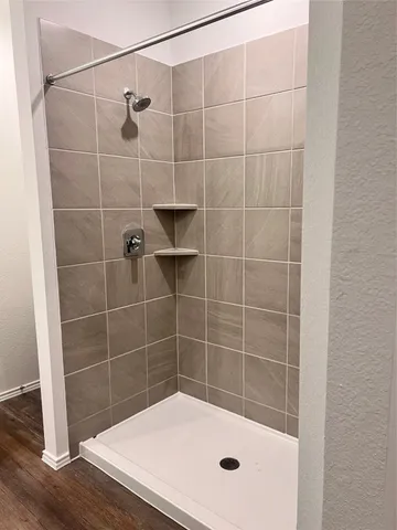 a bathroom with a bath tub