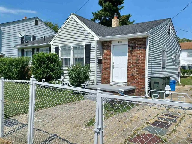 a front view of a house with a porch