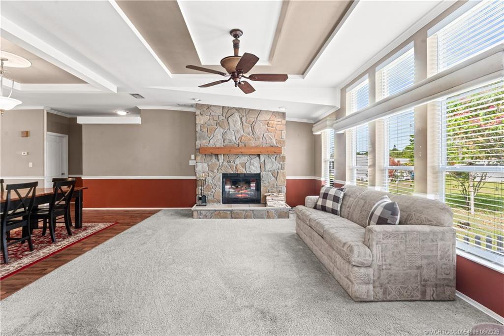 4237 4th Court Lantana, FL 33462 - Photo 12 of 40 a living room with furniture a fireplace and a large window