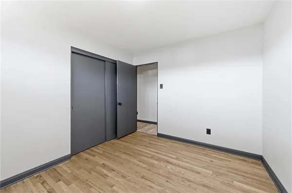 a bathroom with a sink double vanity and a mirror