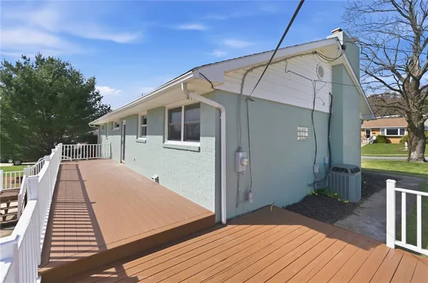 a view of a house with backyard from deck