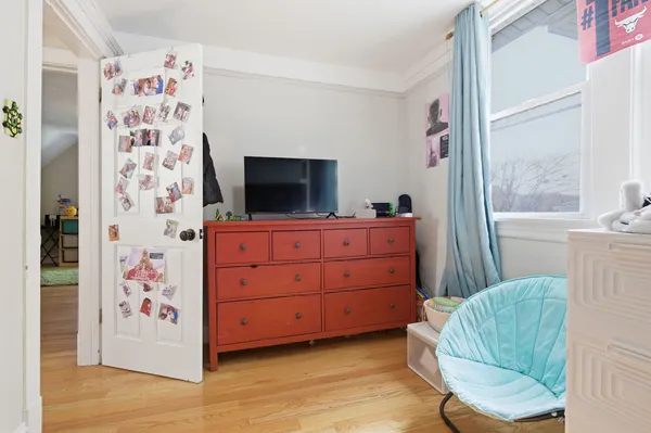 a utility room with dryer washer and stair