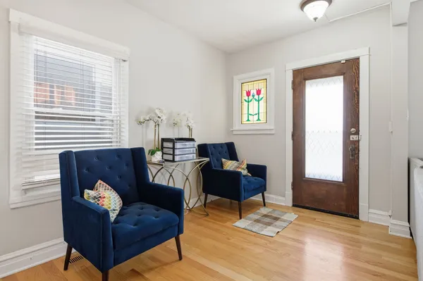 a living room with furniture and a window