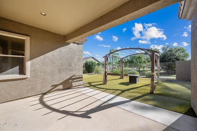a view of a swimming pool with lounge chair